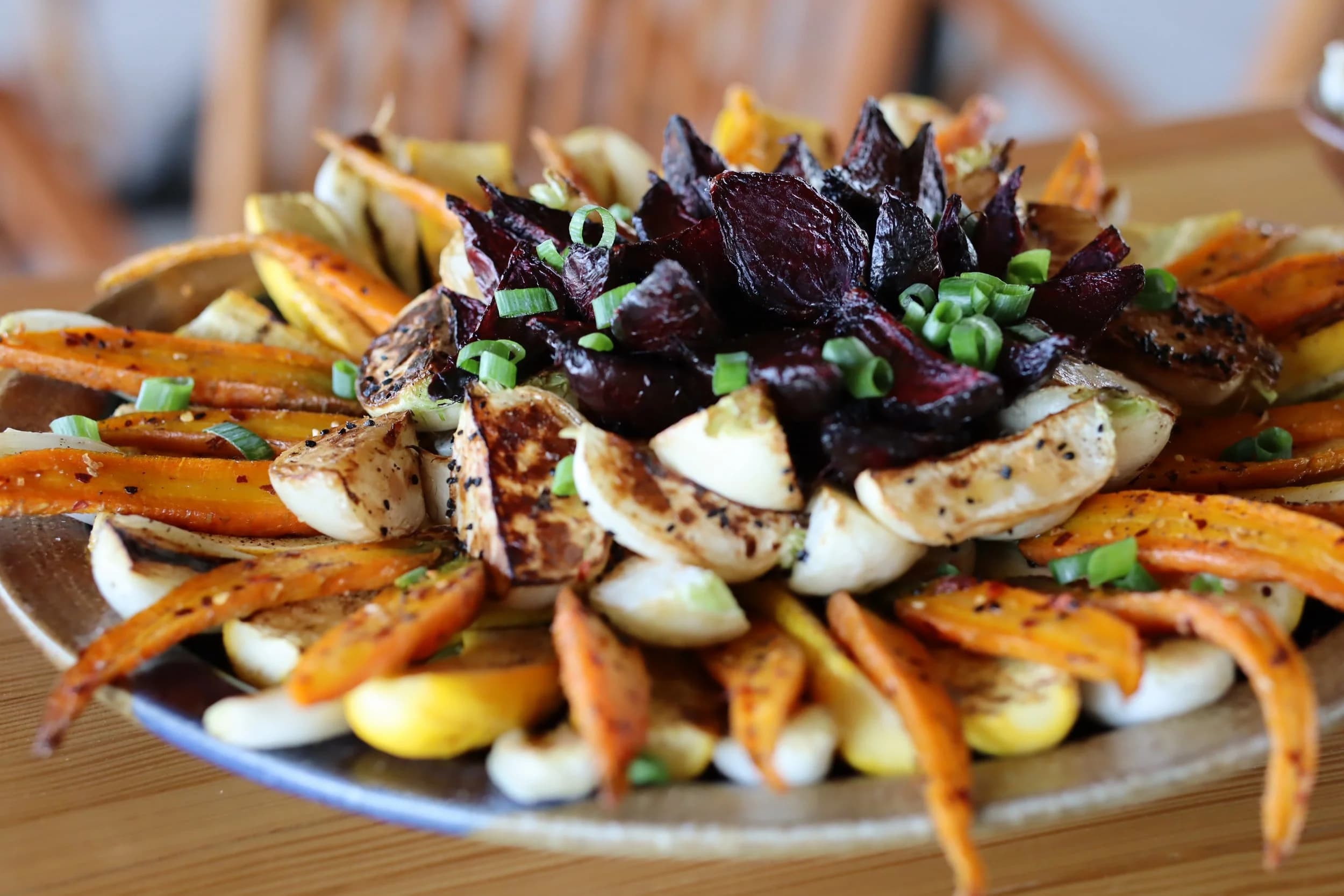 A platter of roasted carrots, turnips, and beets from the farm